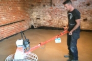 Troweling up inside farm building